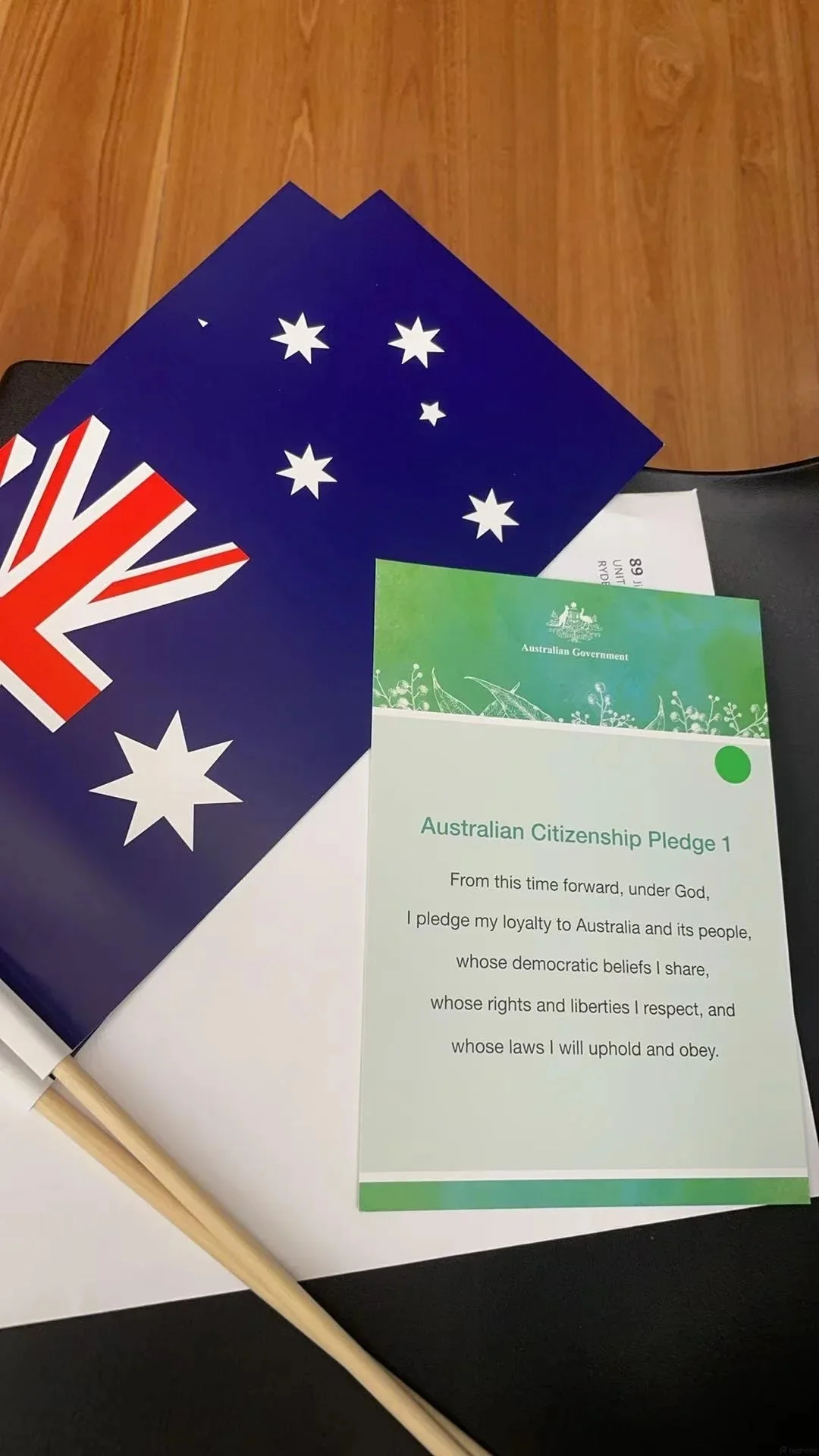 Australian flag and citizenship certificate